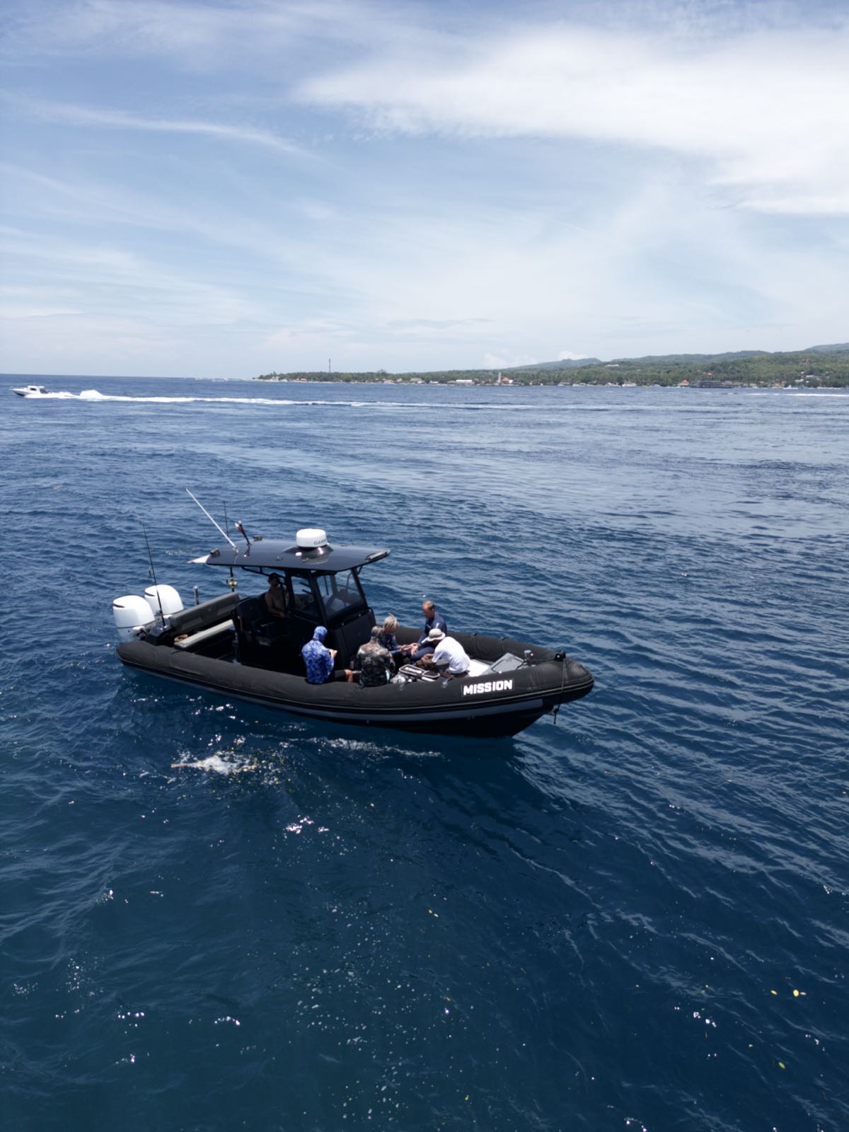 The MISSION private speedboat on open water off Bali
